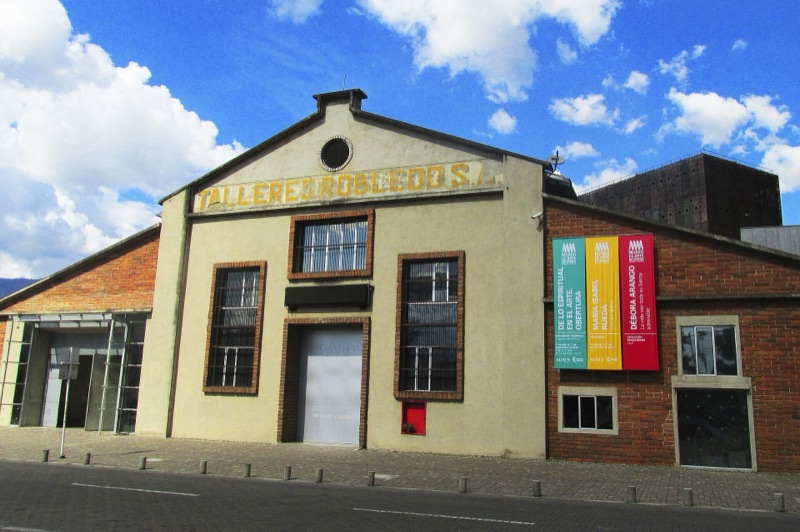 The brick and cream facade of the old Talleres Robledo steelworks, home of the MAMM in Ciudad del Río